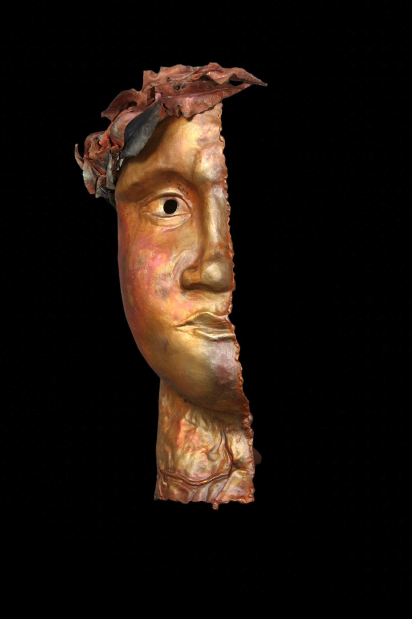 Half truth. Repousse on copper, relief wall sculpture.