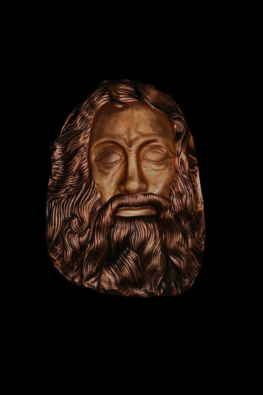 Mask of Odyssey repousse on copper relief wall sculpture.